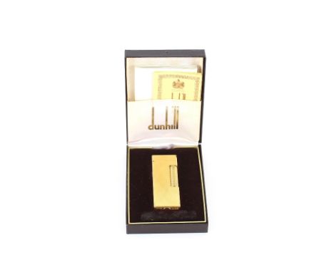 A Dunhill cigarette lighter in case