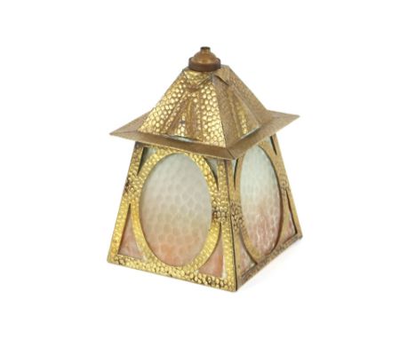 An Art Nouveau design brass spot hammered brass porch light