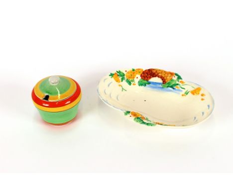 A Clarice Cliff preserve pot with multi coloured banded decoration and a Clarice Cliff oval dish with raised floral and bridg