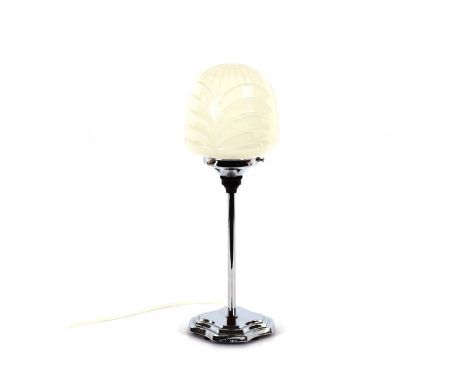 An Art Deco design chrome table lamp with milk glass shade