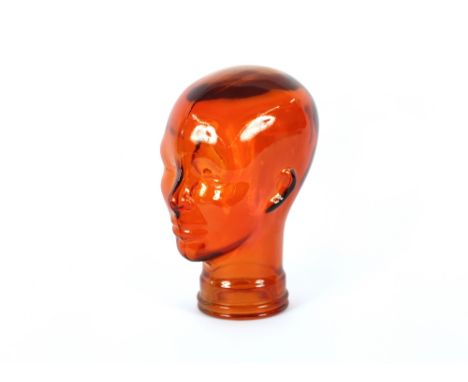 An Art Deco design ruby glass mannequin head, 28cm high