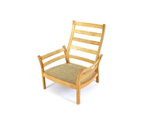 A light Ercol ladder back three piece suite - lacking cushions 