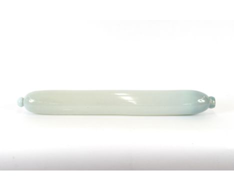 A large opalescent glass rolling pin, 79cm long