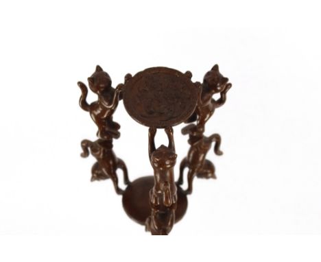 An oriental style bronze cat ornament 