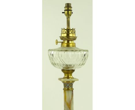 A Victorian onyx oil lamp with gilt brass and champleve enamel mounts, cut-glass font, converted to electric, height includin