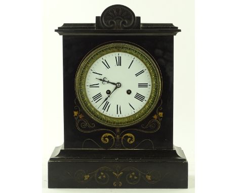 A Victorian black slate cased architectural mantel clock, enamelled dial and 8-day striking movement, height 40cm.
