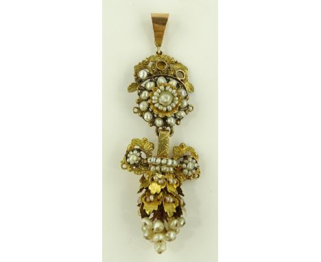 A Victorian unmarked gold and pearl set pendant, drops set with seed and split pearls, height 67.7mm, 6.3g