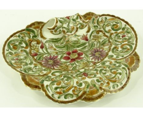 A Zsolnay Pecs table centre bowl, relief moulded and gilded floral designs, width 30cm