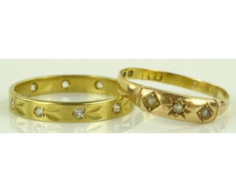 An 18ct gold paste set eternity ring and an 18ct gold 3 stone diamond and pearl ring, 4.5g gross, (2)