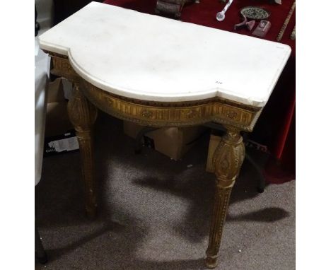 An ornate 19th century, gilt gesso console table, with shaped marble top, width 27"