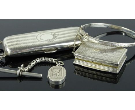 A group of various silver items, including a large vinaigrette and a lady's cigarette case