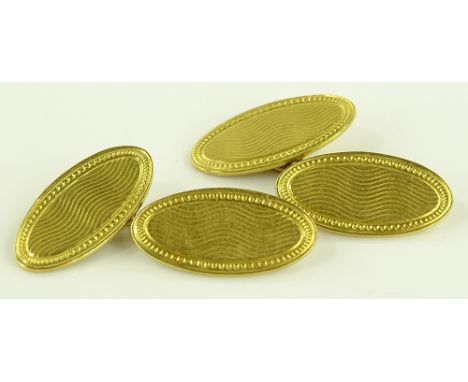A pair of 18ct gold textured oval cufflinks, panel length 21.3mm, 10g gross