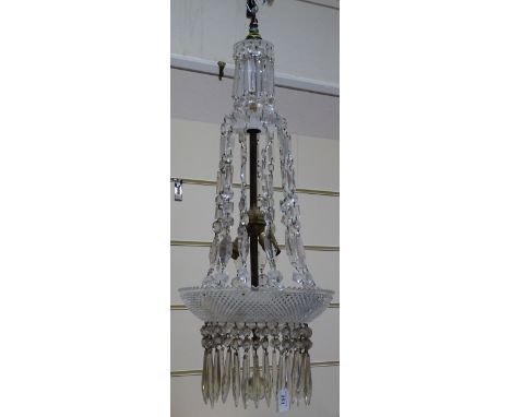 An early 20th century cut-glass hanging light fitting, with tiers of lustre drops, overall height 85cm