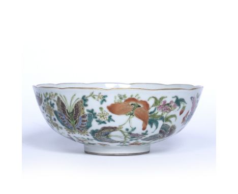 Enamel decorated bowl Chinese, 19th Century decorated to the outside with butterflies and flowers, the rim with a lobed style