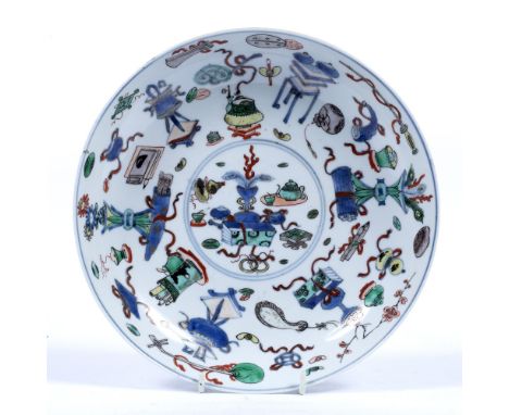 Porcelain famille verte saucer shaped dish Chinese, Kangxi (1662-1722) decorated centrally with a medallion of household vess