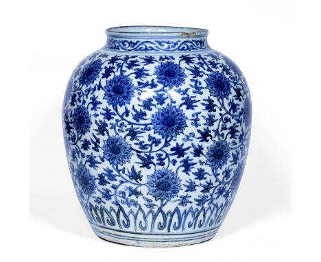 Blue and white ovoid bodied jar Chinese, late Ming (1368-1644) decorated with an overall Indian lotus and trailing foliage de