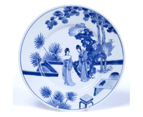 Blue and white plate Chinese, Kangxi (1662-1722) decorated with a walled garden scene within which two 'Long Eliza' figures s