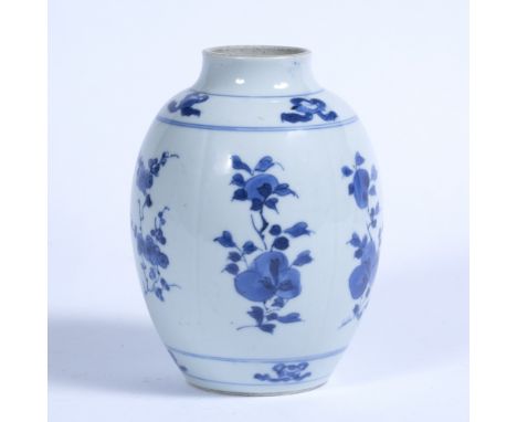 Blue and white vase Chinese, Kangxi (1662-1722) decorated in lobed panels depicting flowers with a lower and a higher border 