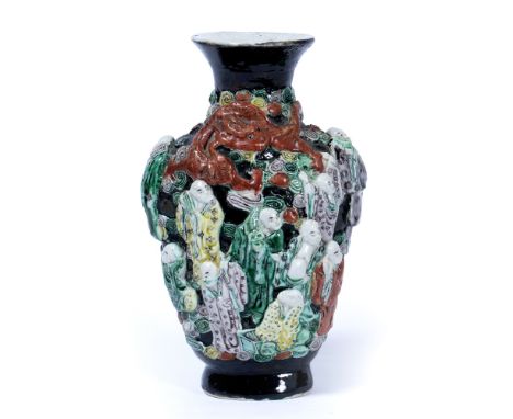 Black ground porcelain vase Chinese, early 20th Century with raised immortals, Zhuanshu mark Kangxi22cm