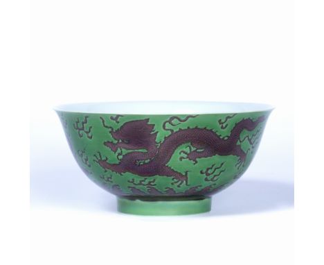 Porcelain bowl Chinese decorated on a green ground with five clawed dragon guarding sacred pearls against a background of sty