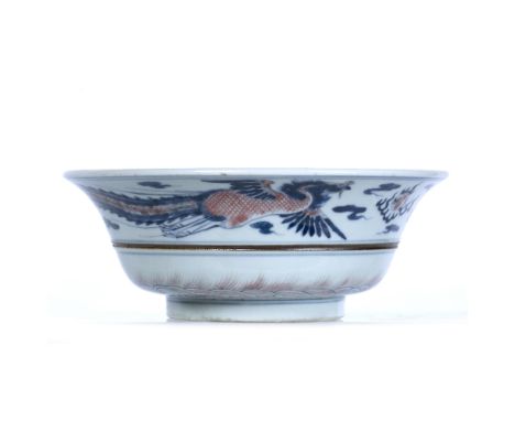 Blue and white dragon and phoenix bowl Chinese decorated to the rim with a phoenix and dragon in flight above clouds, six cha