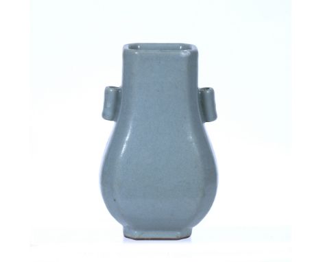 Hu shaped porcelain vase Chinese, 19th Century with cylindrical handles, the body decorated with a greyish blue glaze, foot w