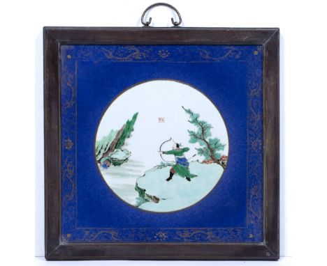 Framed porcelain plaque Chinese, Kangxi (1662-1722) decorated with a central circular panel in famille verte colours depictin