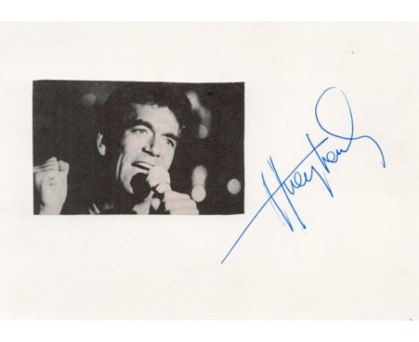 Huey Lewis signed album page. Lewis, is an American singer, songwriter, and actor. Lewis sings lead and plays harmonica for h