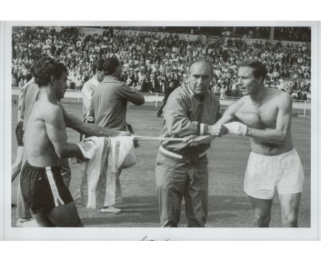 Football George Cohen signed 20x14 black and white print picturing the iconic moment after the infamous 1966 Quarter Final ag
