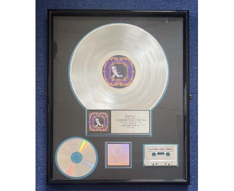 Singer, Elton John commemorative Platinum Sales Award framed and professionally presented. This item was presented to MCA Rec