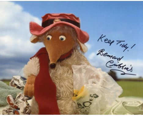 The Wombles. 8x10 photo signed by actor Bernard Cribbins who was narrator for the series. Good condition. All autographs come