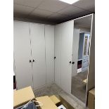 Light brown coloured ex display corner wardrobe unit, circa 2100 x 2100mm, with mirror door and pull