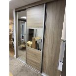 Sliding door built in wardrobe comprising of three sliding doors & associated rails, built in