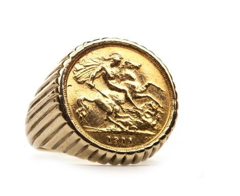 GOLD HALF SOVEREIGN DATED 1911, mounted to a nine carat gold ring, size R 1/2, 16.5g gross