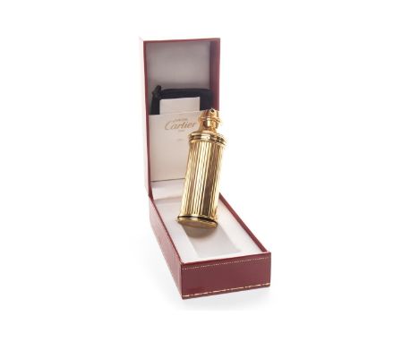 CARTIER REFILLABLE PERFUME BOTTLE, of cylindrical column-like form, gold coloured, with striations to the body, with detail i