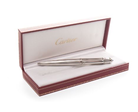 CARTIER RETRACTABLE BALLPOINT PEN, silver coloured, with linear striations to the whole case, engraved with 104035 engraved t