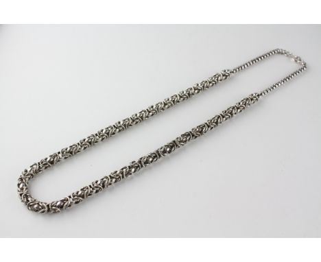 An ornate 19 inch byzantine style necklace, bolt ring clasp. No hallmark - tests indicate silver (standard inconclusive) 42.2