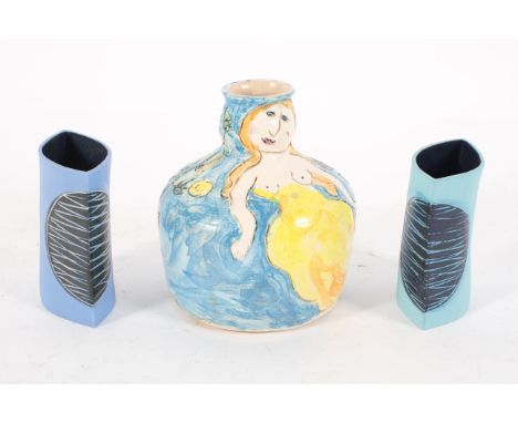 Dora Holzhandler, a painted and incised vase, signature and stamp to base, 12cm high; two Bryony Burn vases, signed , 8.5cm h