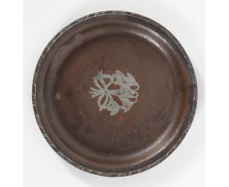 An Arts and Crafts hammered copper circular tray, by Hugh Wallis, inlaid with white metal snowdrops, HW stamp, 19.5cm diamete