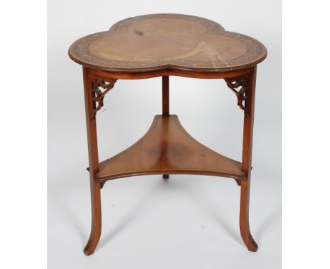 A late Victorian walnut and inlaid trefoil table, with floral and ribbon inlay to the top, and a concave triangular shelf, 68