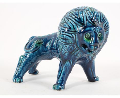 Alvino Bagni, Italian 1960's vintage pottery lion by Rosenthal Netter, finished in a blue glaze, repair to face, 19cm high