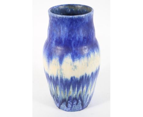 A Ruskin vase, of bulbous form, with a streaking and crystalline blue and white glaze, impressed W Howson Taylor and factory 