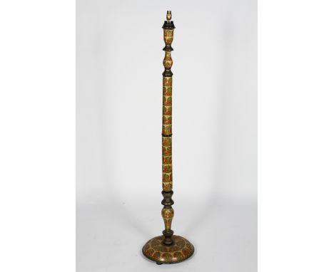 An Indian lacquered painted and gilded standard lamp, with arched flowering and foliate panels, 157cm high