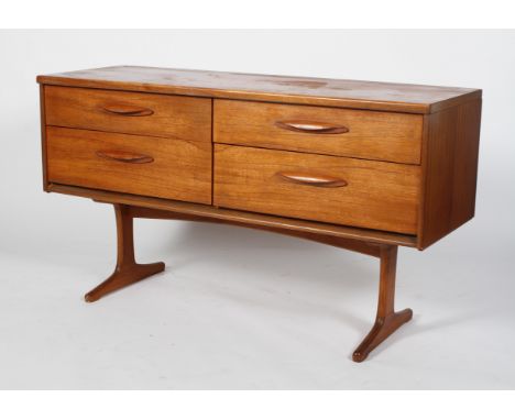 A 1960's retro vintage Austinsuite teak wood four drawers sideboard with lipped handles to each, all raised on a pair of spla