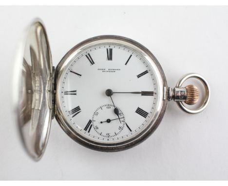 A full hunter pocket watch. Circular white dial with Roman numerals, signed John Edmond, Dunedin. Manual wind movement. Hallm