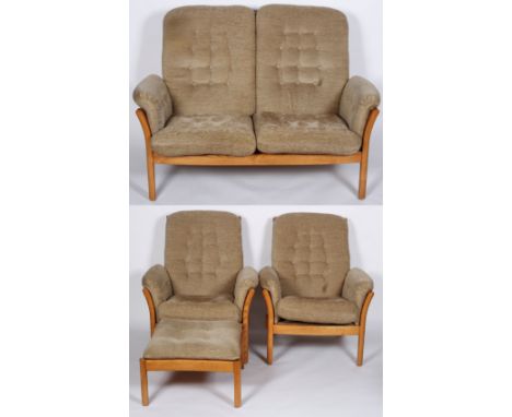 An Ercol Saville sofa suite, comprising  a two seat sofa, two armchairs and a foot stool, all in blonde beech and elm