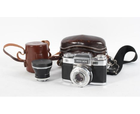 A Zeiss Ikon camera, with Contaflex Synchro-Compur-X lens and leather case; and a Zeiss Pro-Tessar 1:4 lens and case (2)