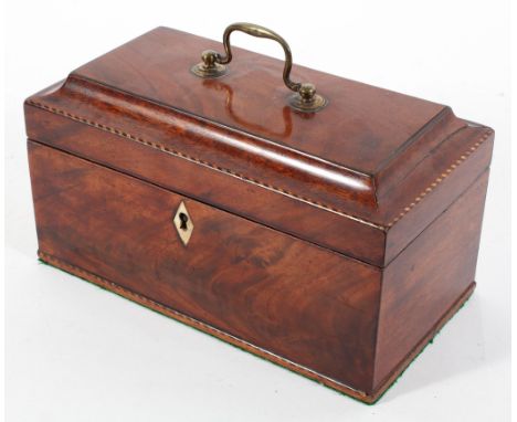 A George III mahogany and string inlaid tea caddy, with sarcophagus top and three lidded pewter canisters 13cm high x 24cm wi