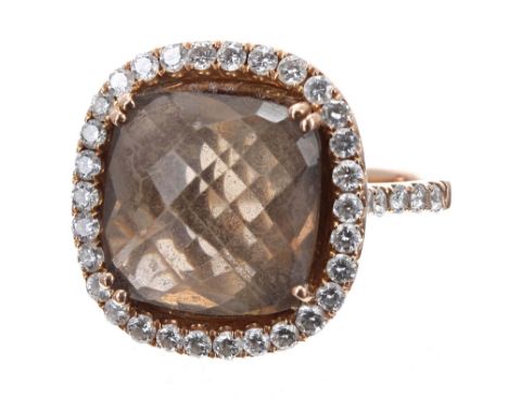 18k cushion-cut smoky quartz and diamond cluster ring, with round brilliant-cut diamond and set shoulders within a basket mou