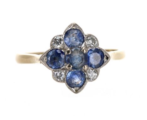 18ct sapphire and diamond cluster ring, with five sapphires and four diamonds in a millegrain setting, 3.3gm, ring size M